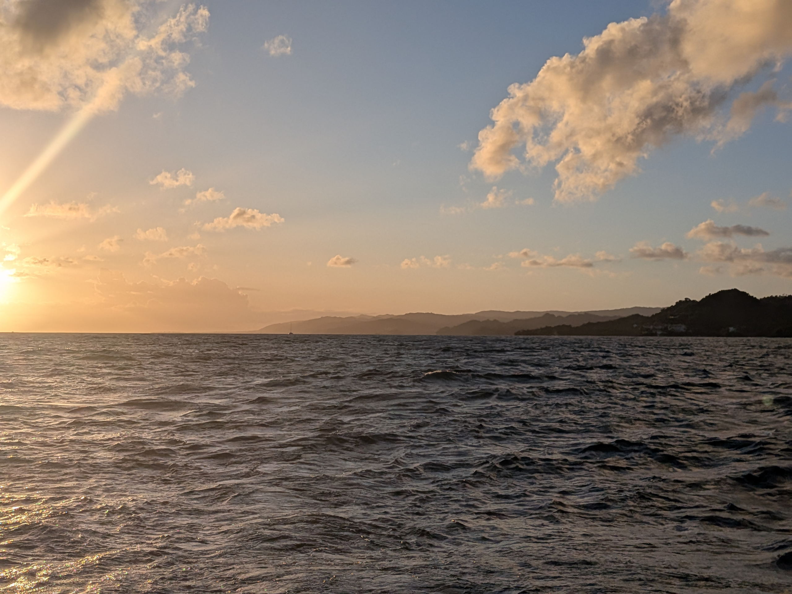 The sun sets on the Dominican Republic as we leave it behind for Puerto Rico.